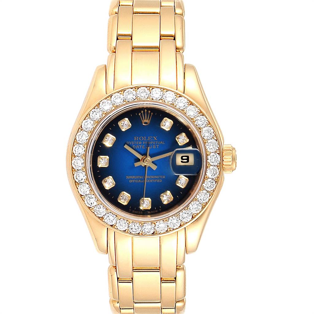 The Rolex Pearlmaster 69298 Women's Yellow Gold Blue Dial 69298 Women's Yellow Gold Blue Dial watch is shown from a front angle, displaying its bezel, dial, bracelet, and date window.