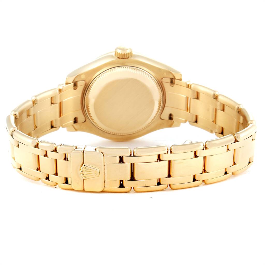 The image shows a Rolex Pearlmaster 80298 Women's Yellow Gold Mother of Pearl Dial 80298 Women's Yellow Gold Mother of Pearl Dial watch from the back, highlighting its gold case, bracelet, clasp, and crown.