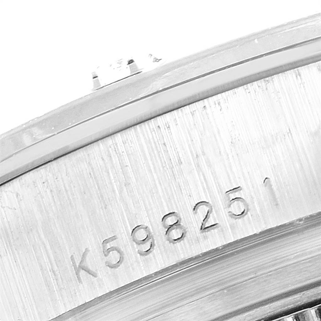 This image shows a close-up of the serial number engraved on the side of a Rolex Pearlmaster 80319 Women's White Gold White Dial 80319 Women's White Gold White Dial watch case.