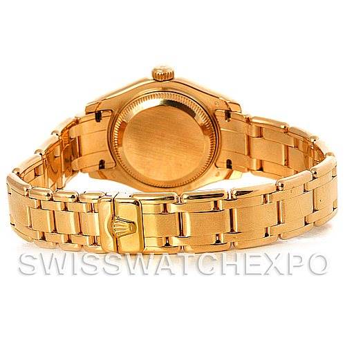 This image shows the back and bracelet of a Rolex Pearlmaster 802998 Women's Yellow Gold Mother of Pearl Dial 802998 Women's Yellow Gold Mother of Pearl Dial watch, displaying its gold finish and Rolex clasp.
