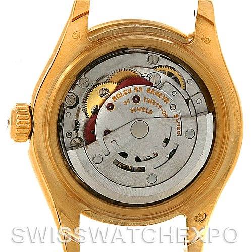 This image shows the back view of the Rolex Pearlmaster 802998 Women's Yellow Gold Mother of Pearl Dial 802998 Women's Yellow Gold Mother of Pearl Dial watch, highlighting its internal mechanical movement.