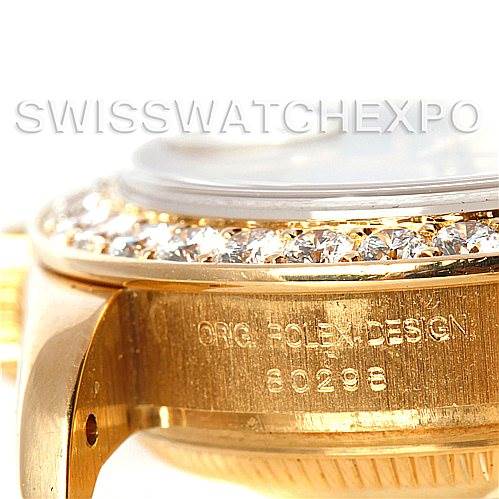 This image shows a close-up angle of the Rolex Pearlmaster 80298 Women's Yellow Gold Mother of Pearl Dial 80298 Women's Yellow Gold Mother of Pearl Dial's side, highlighting the bezel, diamond setting, and serial number engraving.