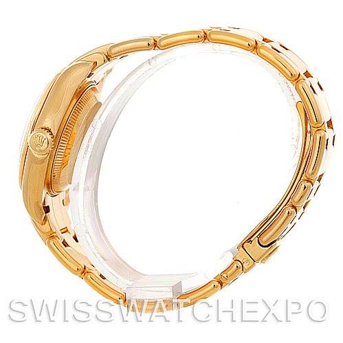 This side view of the Rolex Pearlmaster 80298 Women's Yellow Gold Mother of Pearl Dial 80298 Women's Yellow Gold Mother of Pearl Dial watch highlights its gold bracelet and winding crown.