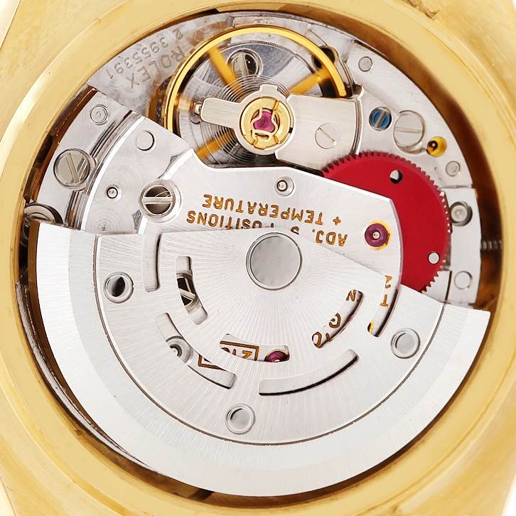 This image shows the internal mechanical movement of the Rolex Pearlmaster 69308 Women's Yellow Gold  69308 Women's Yellow Gold  watch from a back angle.